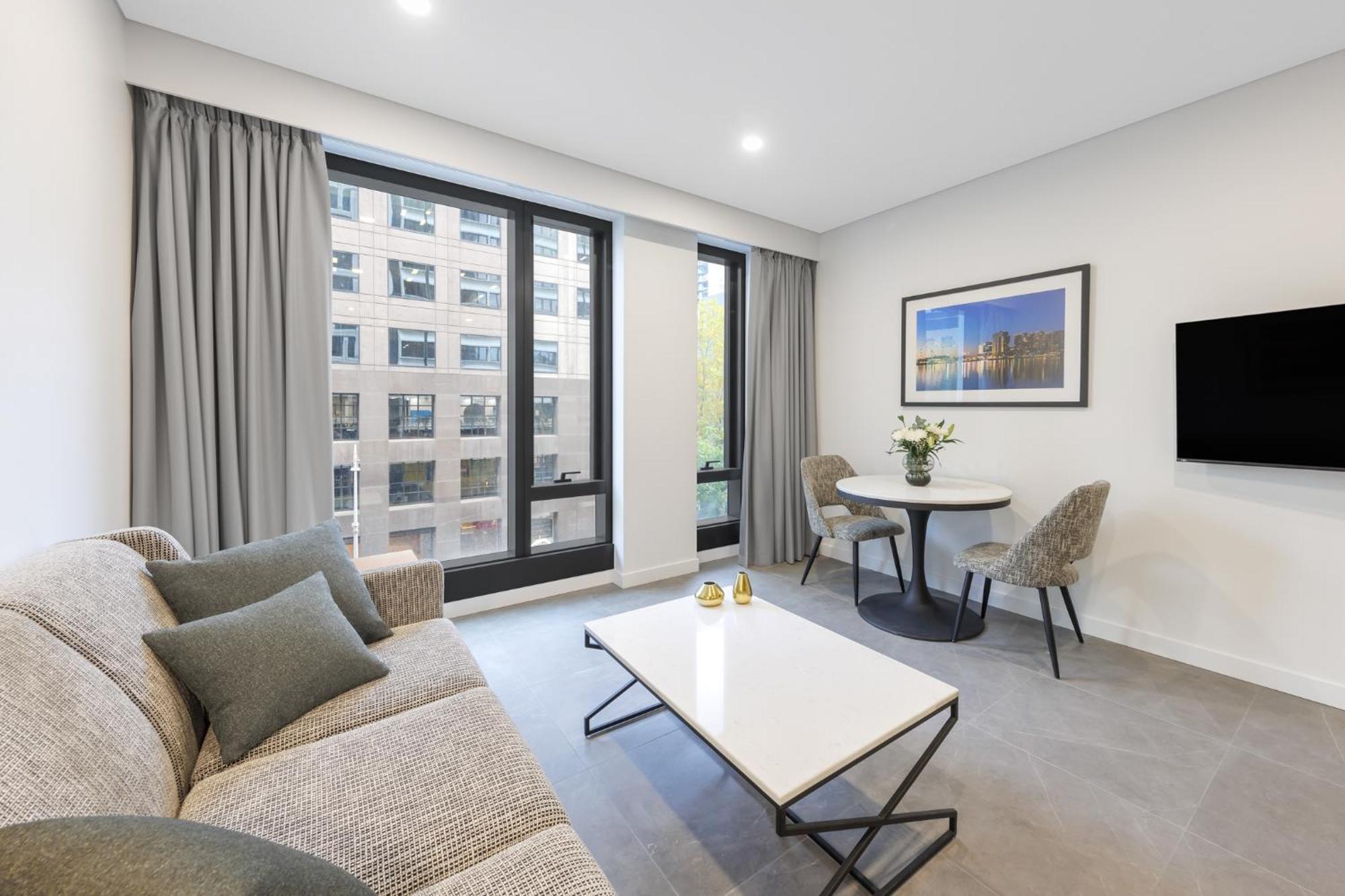Meriton Suites Melbourne Exteriör bild A staged apartment at The Standard