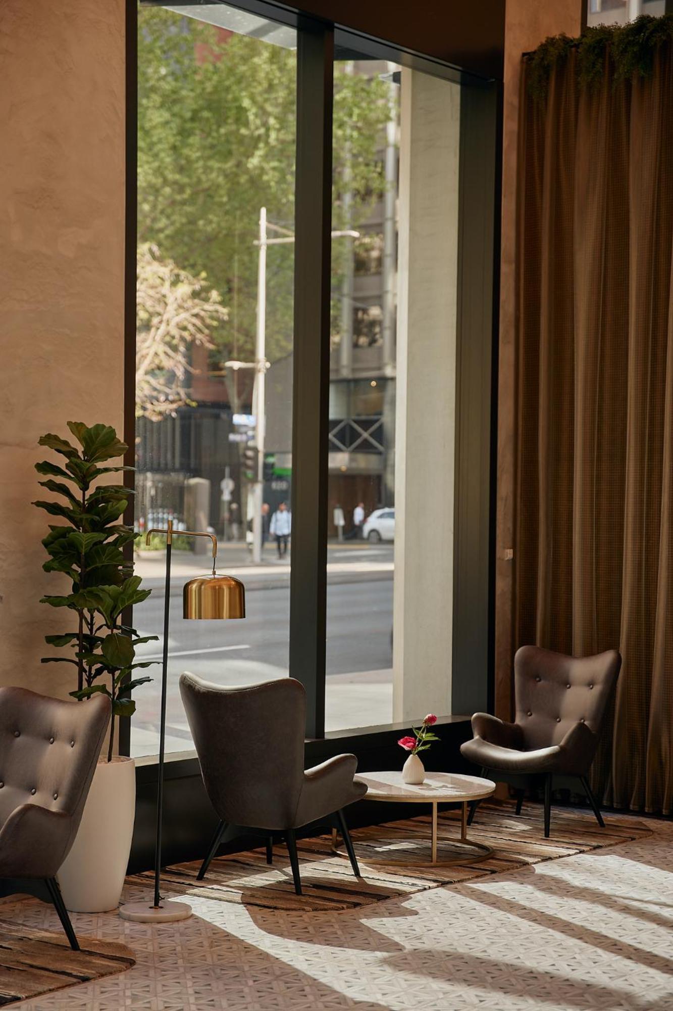 Meriton Suites Melbourne Exteriör bild The interior of the hotel